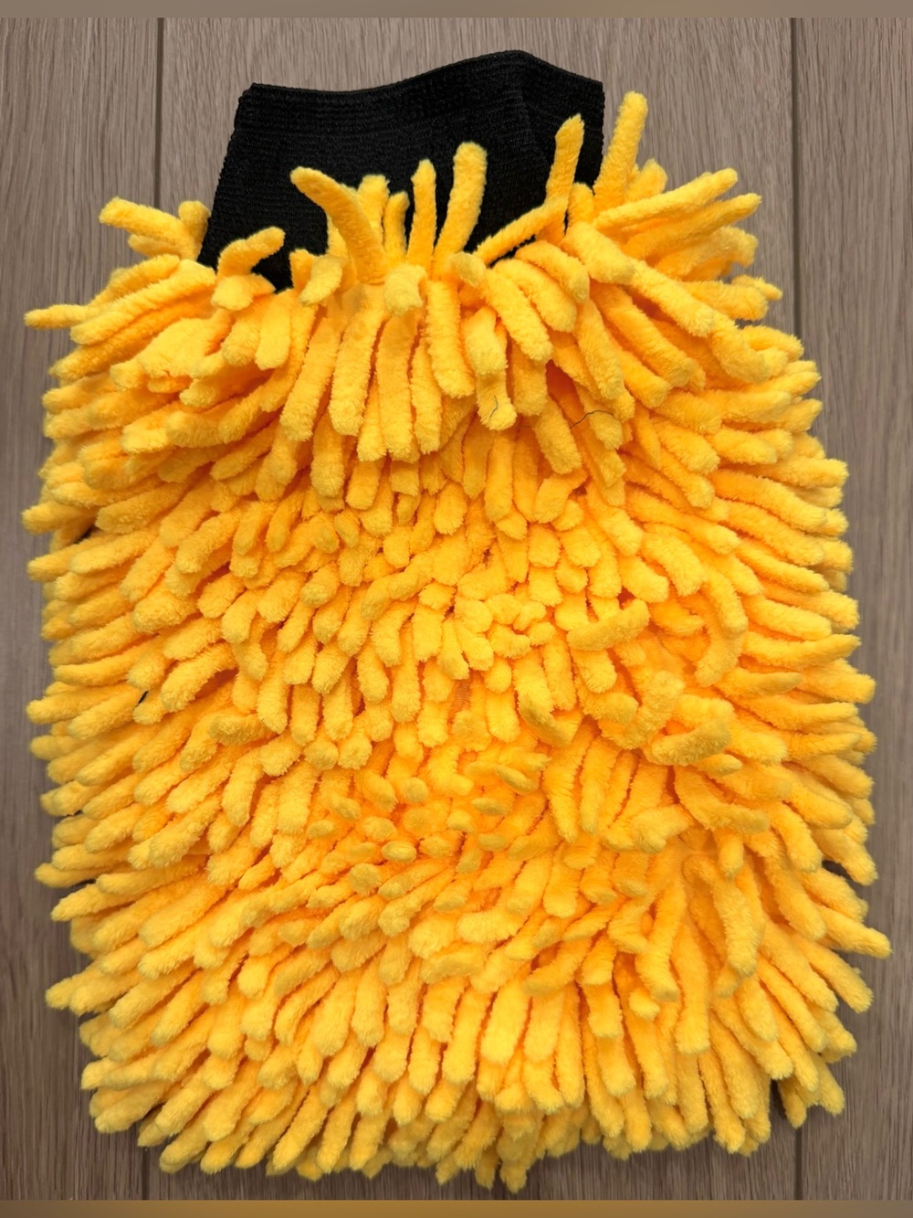 New- yellow microfiber wash glove- film inside to keep hand dry